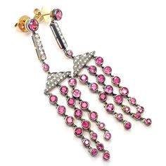 These earrings are for pierced ears.  Metal: 18k yellow gold  Measurements: 2 3/4" x 1/2"  Weight: 15.9 grams  Stones: 42 rose cut diamonds SI1 clarity, H color total weight approximately 1ct 42 pink sapphires total weight approximately 7ct  Hallmarks: Laura Munder 750    Please read description for most accurate dimensions and use QA to inquire on any additional details. Luxury Pink Diamond Earrings With Accents, Luxury Pink Sapphire Earrings For Formal Occasions, Luxury Pink Diamond Earrings, Pink Diamond Earrings With Accents, Luxury Rose Cut Diamond Dangle Earrings, Luxury Pink Sapphire Earrings, Pink Diamond Drop Earrings In Fine Jewelry Style, Pink Diamond Drop Earrings Fine Jewelry, Luxury Pink Sterling Silver Earrings