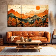 a living room with two couches and paintings on the wall above them, along with a coffee table