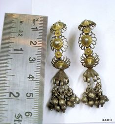 Vintage Antique tribal old silver earring pair from Rajasthan India. Worn by tribal people of Rajasthan. Beautiful workmanship all over the pieces and adorn with silver bells. Nice old worn pair good for jewellery collection.Length - 5.5 cm (2.16") Weight - 10.5 grams Material - Silver and original old worn pair. Vintage Fine Jewelry, Silver Jewelry Earrings, Silver Bells, Rajasthan India, Message Jewelry, Stunning Necklace, Silver Earring, Jewellery Collection, Vintage Jewellery