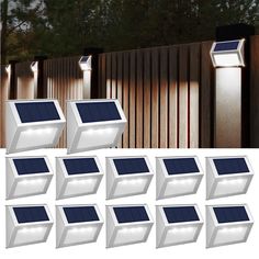 six solar powered lights on the side of a fence