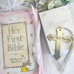 two books and a cross on a table