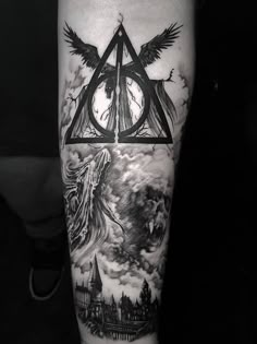 a black and white photo of a harry potter tattoo