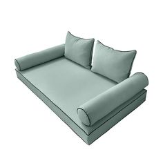 a large gray couch with two pillows on the top and one pillow on the bottom