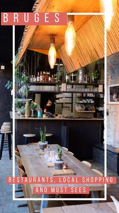 a restaurant with wooden tables and hanging lights over the bar area that says bruges restaurants, local shopping and must see