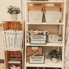 a book shelf filled with books and baskets