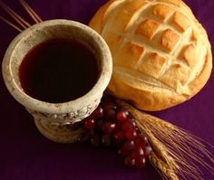 an image of bread and grapes on a purple background with the words good friday written below it