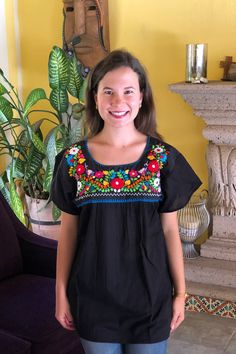 Mexican blouse, blouse with beautiful multicolored floral embroidery, blanket blouse, ethnic blouse, hand-embroidered blouse. The embroideries of each blouse are unique so they may vary Mexican textile art has centuries of history and creativity throughout the country. Mexico is recognized as one of the leading countries with a beautiful aristic production in the textile world, miraculous hands of talented artisans from different states of the country create stunning embroidery clothing, and var Spring Fiesta Embroidered Top With Embroidered Neckline, Folk Style Embroidered Top With Floral Embroidery For Fiesta, Folk Style Embroidered Top For Fiesta With Floral Embroidery, Folk Style Floral Embroidered Top For Fiesta, Multicolor Embroidered Top For Fiesta, Multicolor Embroidered Top For Spring Fiesta, Spring Fiesta Multicolor Embroidered Top, Embroidered Multicolor Cotton Peasant Top, Folk Style Multicolor Embroidered Top For Fiesta