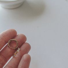 Our Isla Hoops are your new favorite tiny hoops! They are so sparkly and unique. They're minimalist + chic, and look great adorned with other earrings if you have multiple piercings!FEATURES Cubic zirconia 16k gold plated or rhodium (silver) hoops Nickel-free You will receive two earrings Minimalist Stackable Everyday Earrings, Dainty Everyday Stackable Cartilage Earrings, Everyday Adjustable Stackable Earrings, Adjustable Stackable Earrings For Everyday, Dainty Adjustable Stackable Earrings, Adjustable Everyday Cartilage Earrings, Adjustable Tarnish Resistant Piercings For Everyday, Multiple Piercings, Minimalist Chic