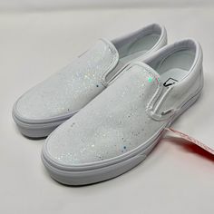 ABOUT:Make every day feel like a celebration with these dazzling, yet comfortable white crystal glitter shoes by ButterMakesMeHappy! Each pair is hand painted using durable materials & water-resistant finishes, with a base that is so sparkly, you’ll light up the room! Whether their for your wedding, a special event or a stylish outfit, order now & see why we've been the #1 glitter shoe customizers in the last 9 years! -This listing includes 1 pair of hand painted shoes. Brand, size & style is ba Painted White Vans, Sparkly Vans, Glitter Vans, Sk8 Hi Vans, Slip On Vans, Hand Painted Shoes, Crystal Shoes, White Vans, Glitter Shoes