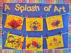 a splash of art is displayed on a bulletin board