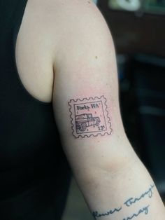 a woman's arm with a stamp on it