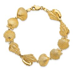 14k yellow gold textured assorted shell link bracelet. Measures approximately 9/16 of an inch in width and has a lobster claw clasp. Elegant Gold Shell Bracelets, Elegant Yellow Gold Beach Bracelets, Elegant Shell-shaped Bracelets, Diy Jewelry Rings, Beach Bracelet, Jewelry Tattoo, Beach Bracelets, Shell Bracelet, Jewelry Lookbook