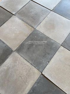 an image of a tile floor that looks like it is made out of cement blocks