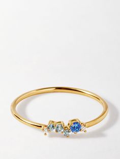 A ray of vibrant blue gemstones, just like the Spring sun you needed. Set with blue sapphire and diamonds, this dainty 14k gold ring is exquisite and refined. 14k Recycled Solid Gold. Lab-grown Blue Sapphire, One 2.2mm Brilliant Cut. Lab Grown Diamonds, Two 1.2mm Brilliant Cut. Swiss Blue Topaz and London Blue Topaz gemstones. Blue Ring, Manolo Blahnik Maysale, Purple Belt, Cream Cat, Triple Hoop Earrings, Spring Makeup, Swiss Blue Topaz, 14k Gold Ring, London Blue