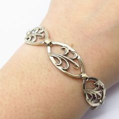 Great vintage condition.  925 Sterling Silver / 14K Gold Vintage Symmetalic Ornate Link Bracelet 7.75"  Weight: 13.1g   WELCOME TO PAWN SHOP We are an actual pawn shop and have been in business for over 25 years. Since 1990, our establishment has been serving a variety of clients by providing them with short term cash solutions and options of liquidity regarding their treasured heirlooms. Acknowledging that today′s customers are very sophisticated and are looking for a variety of investments, ou Classic Filigree Bracelets For Anniversary, Vintage Gold Jewelry With Sterling Silver Clasp, Anniversary Sterling Silver Bracelet With Intricate Design, Gold Antique Sterling Silver Hallmarked Bracelet, Antique Gold-toned Sterling Silver Hallmarked Bracelet, Antique Sterling Silver Bracelet For Anniversary, Vintage Sterling Silver Bracelet In White Gold, Heirloom Style Silver Metal Bracelets, Antique Hallmarked Sterling Silver Bracelet For Anniversary