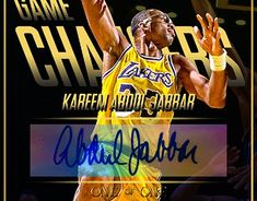 an autographed photograph of a basketball player with the lakers logo on his jersey