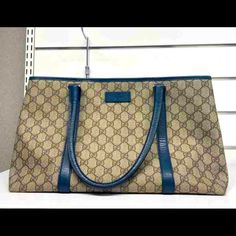 Beige And Blue Gg Supreme Canvas Blue Leather Trim Gold-Toned Hardware Microfiber Lining With Suede-Like Finish Double G Interior Zipper Pocket Double Leather Handles With Classic Blue Gucci Shoulder Bag, Blue Gucci Shoulder Bag For Everyday Use, Blue Gucci Travel Bag, Blue Gucci Shopping Bag, Blue Gucci Bag For Shopping, Blue Gucci Bag, Gucci Tote Bag, Gucci Tote, Blue Leather