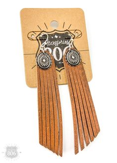 Silver Concho & Leather Fringe Earrings. These dangling earrings are a fun accessory for your trip to Nashville with the girls, the rodeo or just a fun night out at a country music concert. The conchos are silver metal. Choose from black or brown leather. Trendy Adjustable Drop Plug Earrings, Trendy Fringe Jewelry Gift, Trendy Fringe Jewelry As Gift, Trendy Fringe Jewelry For Gifts, Trendy Fringed Jewelry As Gift, Trendy Adjustable Nickel-free Earrings, Festival Concho Dangle Jewelry, Adjustable Western Jewelry For Party, Adjustable Western Style Jewelry For Parties