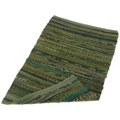 a green rug with multi colored stripes on it's sides and the bottom half folded up