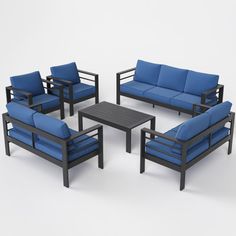 a set of blue couches and chairs on a white background with a black coffee table