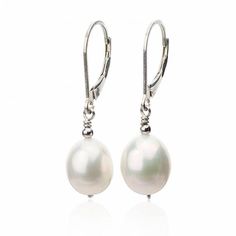 Classic and simple earrings for everyday luxury. Beautiful freshwater cultured teardrop pearls are hung from a sterling silver and mirror bead to create a polished and versatile design. These pearl dangle earrings are a pure and elegant addition to any outfit. Practical and heirloom gift for your everyday hardworking professional woman. Pearl Type: Freshwater Cultured Pearl Shape: Teardrop Pearl Luster: AAA Pearl Color: Natural White Pearl Size: 8x10mm Leverbacks: Sterling Silver, 14K Gold Fill, Pearl Teardrop Earrings, Unique Bridal Jewelry, Pearl Jewelry Gift, Pearl Gifts, White Pearl Earring, Simple Pearl, Pearl Dangle Earrings, Jewelry Gift Ideas, Teardrop Dangle Earrings