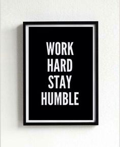 a black and white poster with the words work hard, stay humble on it