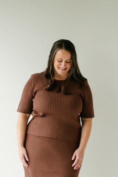 The plus 'Delaney' sweater is what cozy dreams are made of! Made out of the softest ribbed material, the sweater has basic lines, a modest neckline, and comes in a brown color perfect for fall. Pair it with the plus 'Delaney' sweater midi skirt for a set you may never want to take it off! 50% Viscose, 28% Polyester, 22% Nylon Hand Wash Cold Hang or Lay Flat to Dry Do Not Bleach Model Height 5'8" | Wearing Size 1X Please carefully measure a similar item before placing your order to allow for the Cozy Fit Ribbed Top For Fall, Ribbed Cozy Fit Top For Fall, Ribbed Comfortable Fit Tops For Fall, Relaxed Fit Ribbed Knit Top, Cozy Fitted Ribbed Knit Top, Cozy Ribbed Fitted Knit Top, Ribbed Knit Top For Layering, Solid Ribbed Knit Top For Layering, Cozy Ribbed Knit Top For Loungewear