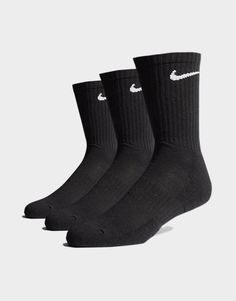 Bring premium comfort to your everyday essentials with this 3 Pack Cushioned Crew Socks from Nike. Made from a comfy cotton blend for a snug wear all day, they feature ribbed cuffs for a stay-put fit. In a low-key black colourway, they're finished with contrasting white Swoosh branding to the ankle cuff. Nike Crew Socks, Socks Gym, Black And White Socks, Sport Nike, Nike Socks, Mens Crew Socks, Comfortable Socks, Sock Packs, Puma Sneakers