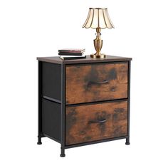 a night stand with two drawers and a lamp on top