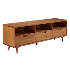 a wooden entertainment center with drawers on one side