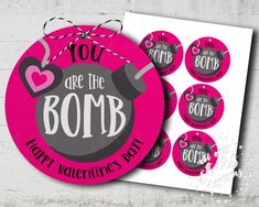 two valentine's day stickers with the words you are the bomb