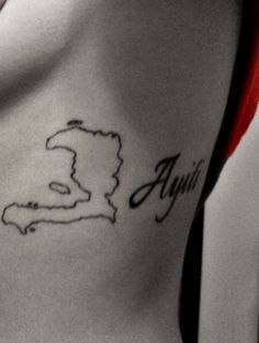 a woman's stomach with a tattoo on it that reads, anni and is in the shape of a map