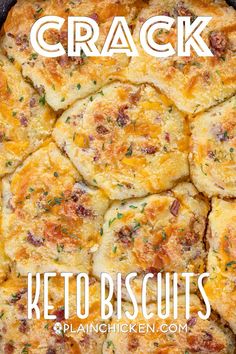 the keto biscuits are topped with cheese and herbs in a cast iron skillet