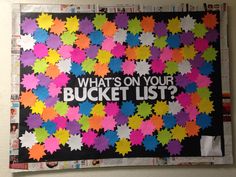 a bulletin board that says what's on your bucket list? with colorful leaves