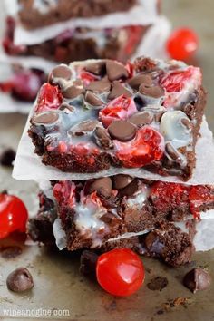 two chocolate cherry brownies stacked on top of each other