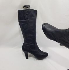 Introducing black cadluke boots, with a round toe. The back has a wide elastic band, which can be stretched to fit your shin. In these beautiful knee-length leather boots, you can conquer the world! Vintage 90's-00's Comfortable heel. Made of soft leather inside and out. Limited edition. Whole, in good condition. Additional photos can send on request. Materials: leather The circumference calf width: 16 - 17 Inches Heel height: 3,4 Inches Boots height with heel included: 18 inches Size - (10,5 US Women Heel Boots, Women High Heels, High Heels Shoes, Comfortable Heels, Womens Knee High Boots, Boots Women, Heels Shoes, Black Leather Boots, 90s Vintage