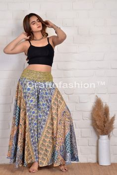 Product Code: 22PLZ6 Size : Regular/Free Indian designer Umbrella Trouser pant with full flair Palazzo as per image with Embroidered Belt (front only) it is made from Vintage Indian silk crepe sarees. Best suitable for Yoga , Dance , Beach wear and regular fashion wear. IMP NOTE: The colour of Picture shown above may slightly vary due to flash light, Screen and camera-resolution. Spring Embroidered Ankle-length Bottoms, Bohemian Full-length Fitted Pants, Bohemian Style Fitted Full-length Pants, Bohemian Full Length Fitted Pants, Bohemian Style Stretch Ankle-length Bottoms, Bohemian Stretch Ankle-length Bottoms, Fitted Harem Pants For Festivals, Bohemian Stretch Bottoms For Festivals, Bohemian Embroidered Long Skirt