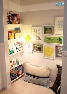 there is a small child's room with pictures on the wall and bookshelves