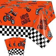 an orange table cloth with black and white checkered design on it, featuring motorcross characters