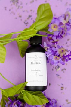 lavender body lotion with green leaves and purple flowers