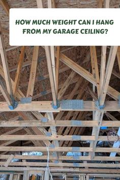 an unfinished garage with the words how much weight can i hang from my garage ceiling?