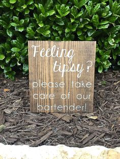 a wooden sign that says, feeling tips? please take care of your barbequer