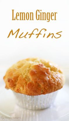 a muffin sitting on top of a white plate with the words lemon ginger muffins