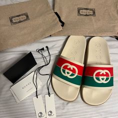 Gucci Sandal Rubber Gg Interlock White/Red/Green. Brand New. Never Worn. Original Box, 2 Dusters. Size 38 (Us 7) Designer Slides With Branded Insole For Beach, Designer Beach Slides With Branded Insole, Designer White Gucci Slides, White Designer Gucci Slides, Designer Beach Sandals With Red Sole, Designer Sandals With Red Sole For The Beach, Gucci Slides For Summer Beach, Designer White Slides For Beach, Designer White Beach Slides