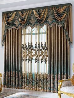 an elegant living room with gold and green curtains, chandelier and chair in front of the window