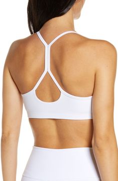 Slim racerback straps enhance the sporty, modern style of a space-dyed sports bra that's ideal for medium-impact activities. 10 1/2" length (size Medium) Medium-impact support Lined 87% polyester, 13% Lycra® spandex Machine wash, tumble dry Made in the USA of imported fabric Women's Clothing Strappy Back Sports Bra For Training, Sports T-back Bra With Built-in Support, Sports Bra With Built-in Bra And T-back, Adjustable Straps T-back Sports Bra For Workout, Adjustable Straps T-back Sports Bra For Yoga, Yoga T-back Sports Bra With Adjustable Straps, Supportive Racerback Sports Bra With Adjustable Straps, T-back Sports Bra With Adjustable Straps For Gym, Supportive White Racerback Sports Bra