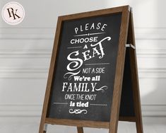 a chalkboard sign with the words please choose a seat not a side we're all family once the knot is tied