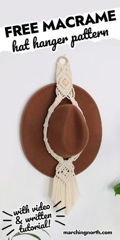 a hat hanging on the wall with text overlay that reads free macrame hat hanger pattern