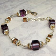 Purple Amethyst Crystal Bracelet Gold Filled Plum by fineheart Amethyst Crystal Bracelet, Plum Wedding, Amethyst Birthstone, Purple Bridesmaids, Necklace Ideas, Rhinestone Crown, Amber Bracelet, Bridesmaid Bracelet, Elegant Bracelet