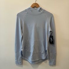 Awaken Hoodie In Tranquil Blue. Size Small. Nwt. Light Blue Athleisure Top For Winter, Light Blue Athleisure Tops For Fall, Light Blue Long Sleeve Athleisure Sweatshirt, Light Blue Long Sleeve Sports Sweatshirt, Light Blue Athleisure Sweatshirt For Winter, Tranquil Blue, Striped Hoodie, Women Long Sleeve Tops, Zip Up Sweater